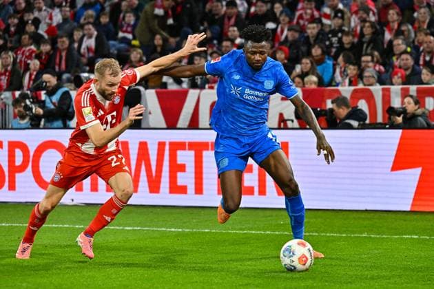 Bundesliga; FC Bayern München - Bayer 04 Leverkusen; 01.11.2025 MÜNCHEN, DEUTSCHLAND - 1. NOVEMBER: im Duell Konrad LAIMER (FC Bayern Munich 27) und Edmond TAPSOBA (Bayern Leverkusen 12) während dem Bundesligamatch zwischen dem FC Bayern München und Bayer 04 Leverkusen am 9. Spieltag in der Allianz Arena am 1. November 2025 in München, Germany DFL REGULATIONS PROHIBIT ANY USE OF PHOTOGRAPHS AS IMAGE SEQUENCES AND OR QUASI-VIDEO Copyright: xBEAUTIFULxSPORTS Goldbergx