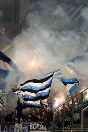 01.11.2025, xrekx, Fussball 2.Bundesliga, SV Darmstadt 98 - Arminia Bielefeld v.l. Bielefeld Fans ,Stimmung, Schals, Trikot, Fahne, Banner, Ultras, Zuschauer, Besucher, Choreo, Choreografie, atmosphere, spectators, Visitors Pyro, Raketen (DFL DFB REGULATIONS PROHIBIT ANY USE OF PHOTOGRAPHS as IMAGE SEQUENCES and or QUASI-VIDEO) Darmstadt