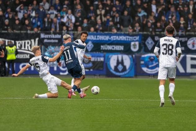 02.11.2025, xhettx, Fussball 3.Liga, TSG 1899 Hoffenheim U23 - SV Waldhof Mannheim v.l. Malte Karbstein (SV Waldhof Mannheim, 15) mit einer grätsche gegen Paul Hennrich (TSG Hoffenheim U23, 11) (DFL DFB REGULATIONS PROHIBIT ANY USE OF PHOTOGRAPHS as IMAGE SEQUENCES and or QUASI-VIDEO) Hoffenheim