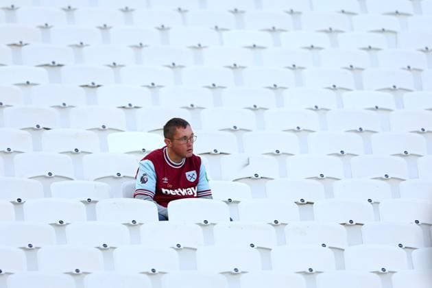 2nd November 2025; London Stadium, London, England; Premier League Football, West Ham United versus Newcastle United; A West Ham United fan sits alone in the stands before the game  JohnxPatrickxFletcher
