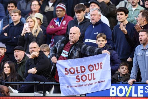 West Ham United v Newcastle United 02 November 2025, London - Premier League Football - West Ham United v Newcastle United - A West Ham fan holds up a banner protesting the club owners - Photo: Jacques Feeney Offside. London UK Copyright: xJacquesxFeeneyx xOffsidexOffside