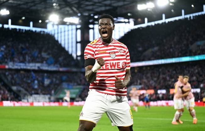 Fussball, Bundesliga, Deutschland, Herren, Saison 2025 2026, 9. Spieltag, Rhein Energie Stadion Köln, 1. FC Köln - Hamburger SV; Jubel Ragnar Ache (KOE) nach seinem Tor zum 1:0. Jubel, Freude, Aktion.