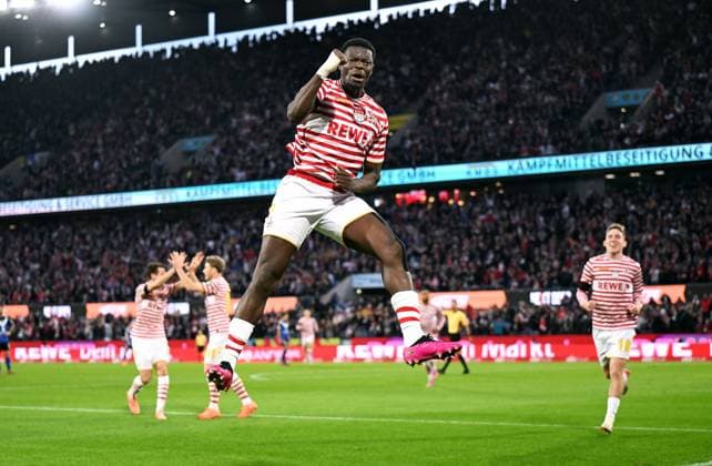 Fussball, Bundesliga, Deutschland, Herren, Saison 2025 2026, 9. Spieltag, Rhein Energie Stadion Köln, 1. FC Köln - Hamburger SV; Jubel Ragnar Ache (KOE) nach seinem Tor zum 1:0. Jubel, Freude, Aktion.