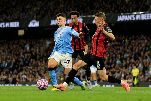 Manchester City v Bournemouth Premier League 02 11 2025. Phil Foden (47) of Manchester City is challenged by Adrien Truffert (3) of Bournemouth during the Premier League match between Manchester City and Bournemouth at the Etihad Stadium, Manchester, England on 2 November 2025. Manchester Etihad Stadium Manchester England Editorial use only DataCo restrictions apply See www.football-dataco.com , Copyright: xConorxMolloyx PSI-23140-0048