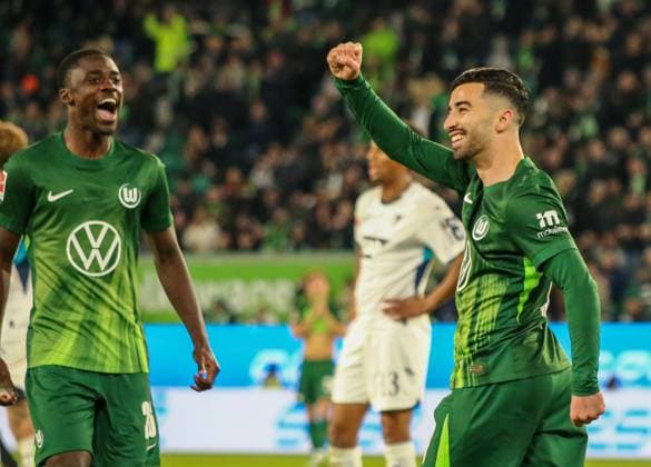 Deutschland: Bundesliga 2025 26, 9. Spieltag - VfL Wolfsburg vs TSG Hoffenheim - Volkswagen Arena (Wolfsburg): Torjubel Mohamed Amoura (VfL Wolfsburg, 9) SaÃ«l Kumbedi Sael Kumbedi (VfL Wolfsburg, 26) Copyright: xAymanxAlahmedx