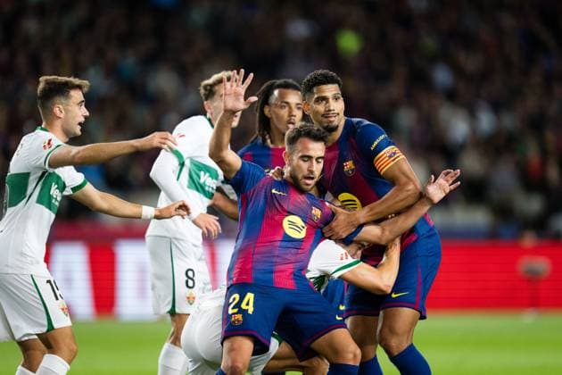 Spanish LaLiga EA Sports FC Barcelona, Barca v Elche CF in Barcelona, Spain. FC Barcelona player (24) Eric Garcia and (4) Ronald Araujo competing during LaLiga EA Sports match between FC Barcelona and Elche CF in Estadi Olimpic Lluis Companys, Barcelona, Spain, on November 2, 2025. Barcelona Estadi Olimpic Lluis Companys Barcelona Spain