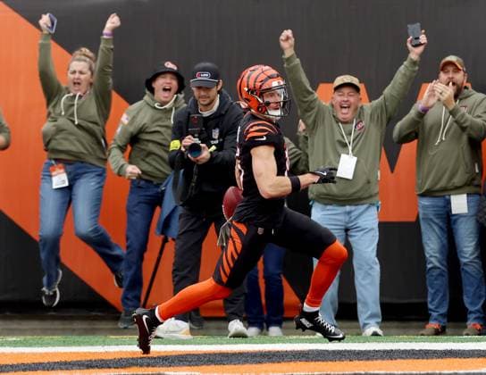 Cincinnati Bengals kick returner Charlie Jones (15) returns the opening kickoff for a touchdown against the Chicago Bears during the first half of play of a preseason game at Paycor Stadium on Sunday, November 2, 2025 in Cincinnati, Ohio.  KYP20251102004 JOHNxSOMMERSxII