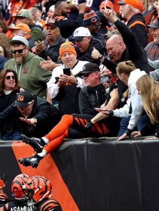 Cincinnati Bengals kick returner Charlie Jones (15) celebrates returning the opening kickoff for a touchdown against the Chicago Bears during the first half of play at Paycor Stadium on Sunday, November 2, 2025 in Cincinnati, Ohio.  KYP20251102007 JOHNxSOMMERSxII