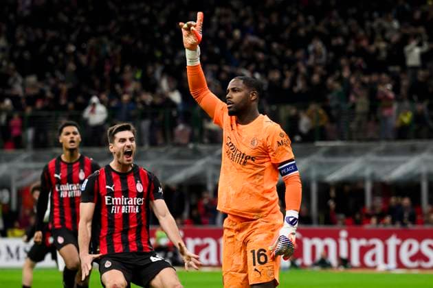 AC Milan v AS Roma - Serie A Mike Maignan of AC Milan celebrates after saving a penalty kick from Paulo Dybala of AS Roma during the Serie A football match between AC Milan and AS Roma. Milan Italy Copyright: xNicolòxCampox