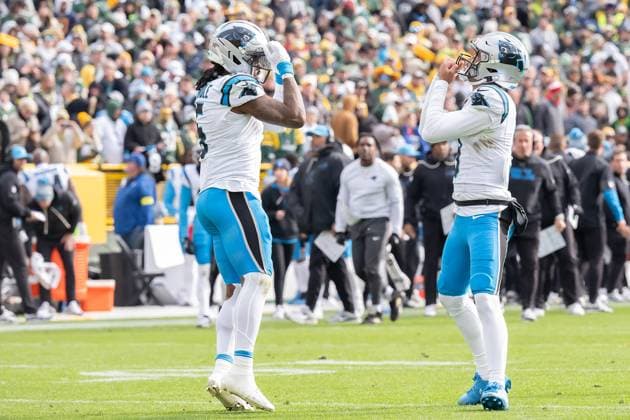 November 2, 2025: Carolina Panthers running back Rico Dowdle (5) and Carolina Panthers quarterback Bryce Young (9) celebrate a touchdown against the Green Bay Packers in Green Bay, WI. Panthers defeated Packers, 16-13. Cal Media. Green Bay United States of America - ZUMAc04_ 20251102_zma_c04_229 Copyright: xKirstenxSchmittx