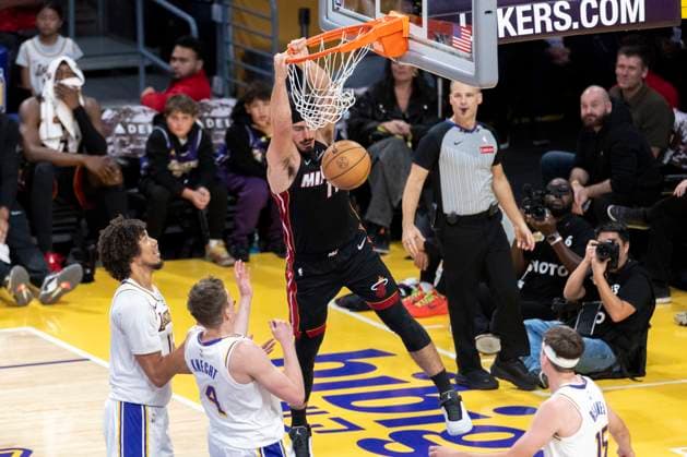 November 2, 2025, Los Angeles, California, USA: Miami HeatÃ¢â‚¬â ¢s Jaime Jaquez Jr. (11) dunks against the Los Angeles Lakers during an NBA, Basketball Herren, USA basketball game, in Los Angeles Sunday, Nov. 2, 2025. Los Angeles USA - ZUMAc68_ 20251102_zaf_c68_073 Copyright: xRingoxChiux
