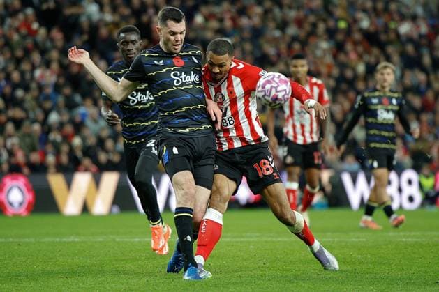 3rd November 2025; Stadium of Light, Sunderland, England; Premier League Football, Sunderland versus Everton; Michael Keane of Everton and Wilson Isidor of Sunderland challenge for the ball  CraigxCowan