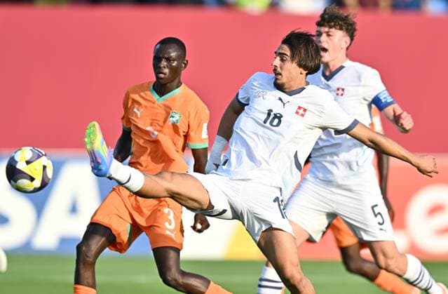 Cote d Ivoire v Switzerland: Group F - FIFA U-17 World Cup Qatar 2025 Llukes Adrien of Switzerland and Koffi Kouadio of Cote d Ivoire in action during the FIFA U-17 World Cup Qatar 2025 Group F match between Cote d Ivoire and Switzerland in Doha, Qatar, on November 4, 2025 DOHA Qatar Copyright: xNOUSHADx