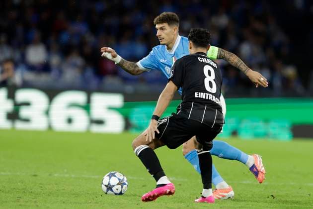 UCL MD4 SSC Napoli vs Eintracht Frankfurt Napoli s Italian defender Giovanni Di Lorenzo challenges for the ball with Eintracht Frankfurt s Algerian midfielder Fares Chaibi During match UEFA Champions League 2025 26 League Phase MD4 SSC Napoli vs Eintracht Frankfurt at Stadio Maradona on November 4, 2025 in Naples _BPH7964 Copyright: xAntonioxBalascox