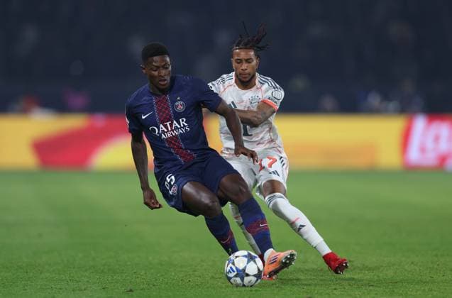. - Paris Saint Germain v FC Bayern Munich, MD4, UEFA Champions League, League Phase, Parc Des Princes Stadium, Paris, France. - 4th November 2025. (C) Daniel Weir Crystal Pix Nuno Mendes of Paris Saint-Germain battles for the ball with Michael Olise of Bayern Munich. - Paris Saint Germain v FC Bayern Munich, MD4, UEFA Champions League, League Phase, Parc Des Princes Stadium, Paris, France. - 4th November 2025. (C) Daniel Weir Crystal Pix Paris Parc Des Princes Stadium France Copyright: xDanielxWeirx CP_PSG_Bayern_Munich_041125_DW_26