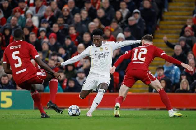 Liverpool FC v Real Madrid C.F. - UEFA Champions League 2025 26 League Phase MD4 Vinicius Junior of Real Madrid CF and Conor Bradley of Liverpool challenge during the UEFA Champions League 2025 26 League Phase MD4 match between Liverpool FC and Real Madrid C.F. at Anfield on November 4, 2025 in Liverpool, England. Liverpool Anfield England United Kingdom Copyright: xRichardxSellers Sportsphoto APLx 14140320