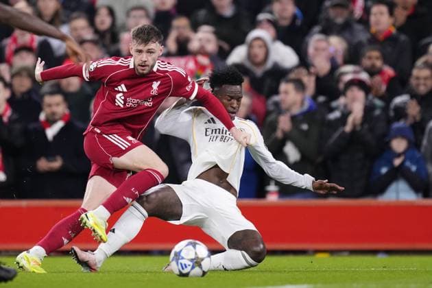 Liverpool FC v Real Madrid C.F. - UEFA Champions League LIVERPOOL, ENGLAND - NOVEMBER 4:Vinicius Junior left winger of Real Madrid and Brazil and Conor Bradley right-back of Liverpool and Northern Ireland compete for the ball during the UEFA Champions League 2025 26 League Phase MD4 match between Liverpool FC and Real Madrid C.F. at Anfield on November 4, 2025 in Liverpool, United Kingdom. Jose Hernandez Anadolu Liverpool United Kingdom. Editorial use only. Please get in touch for any other usage.  Copyright: x2025xAnadoluxJosexHernandezx