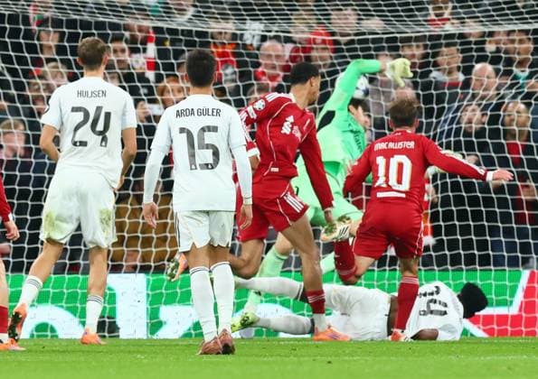 Alexis Mac Allister of Liverpool scores to make it 1-0 Liverpool v Real Madrid, UEFA Champions League, Group Stage, Football, Anfield, Liverpool, UK - 04 Nov 2025Liverpool Anfield United Kingdom EDITORIAL USE ONLY No use with unauthorised audio, video, data, fixture lists, club league logos or live services. Online in-match use limited to 120 images, no video emulation. No use in betting, games or single club league player publications. Copyright: xPaulxCurrie Shutterstockx 15642053ch