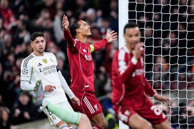 November 4, 2025, Liverpool, Liverpool, England: Virgil van Dijk of Liverpool FC celebrates a goal scored by Alexis Mac Allister during the UEFA Champions League 2025 26 League Phase MD4 match between Liverpool FC and Real Madrid CF at Anfield on November 04, 2025 in Liverpool, England. Liverpool England - ZUMAa181 20251104_zaa_a181_304 Copyright: xDennisxAgyemanx