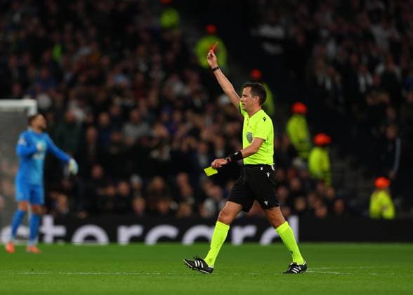4th November 2025; Tottenham Hotspur Stadium, London, England; UEFA Champions League Football, Tottenham Hotspur versus FC Copenhagen; Referee Erik Lambrechts of Belgium gives a red card to Brennan Johnson of Tottenham Hotspur  JohnxPatrickxFletcher