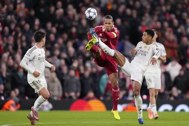 Liverpool FC v Real Madrid C.F. - UEFA Champions League LIVERPOOL, ENGLAND - NOVEMBER 4:Jude Bellingham central midfield of Real Madrid and England and Virgil van Dijk centre-back of Liverpool and Netherlands compete for the ball during the UEFA Champions League 2025 26 League Phase MD4 match between Liverpool FC and Real Madrid C.F. at Anfield on November 4, 2025 in Liverpool, United Kingdom. Jose Hernandez Anadolu Liverpool United Kingdom. Editorial use only. Please get in touch for any other usage.  Copyright: x2025xAnadoluxJosexHernandezx