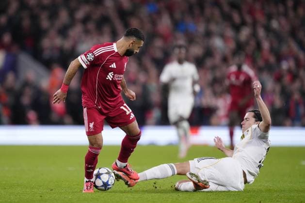 Liverpool FC v Real Madrid C.F. - UEFA Champions League LIVERPOOL, ENGLAND - NOVEMBER 4: Mohamed Salah right winger of Liverpool and Egypt and Alvaro Carreras left-back of Real Madrid and Spain compete for the ball during the UEFA Champions League 2025 26 League Phase MD4 match between Liverpool FC and Real Madrid C.F. at Anfield on November 4, 2025 in Liverpool, United Kingdom. Jose Hernandez Anadolu Liverpool United Kingdom. Editorial use only. Please get in touch for any other usage.  Copyright: x2025xAnadoluxJosexHernandezx
