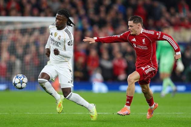 Liverpool, England, 4th November 2025. Eduardo Camavinga of Real Madrid and Florian Wirtz of Liverpool during the Liverpool vs Real Madrid UEFA Champions League match at Anfield, Liverpool. Picture credit should read: James Baylis Sportimage EDITORIAL USE ONLY. No use with unauthorised audio, video, data, fixture lists, club league logos or live services. Online in-match use limited to 120 images, no video emulation. No use in betting, games or single club league player publications. SPI_109_JB_LIVERPOOL_REAL_MADRID SPI-4264-0108
