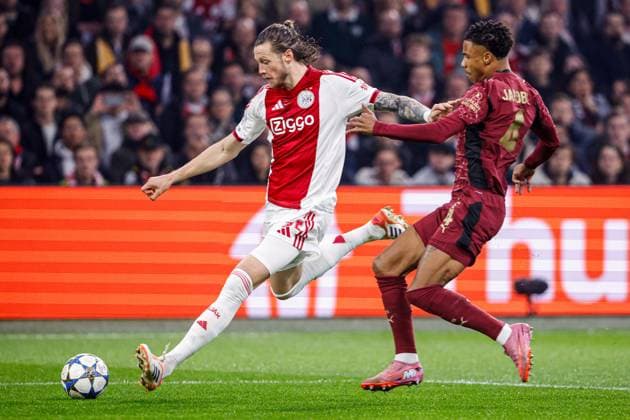 2025-11-05 Ajax v Galatasaray AS - UEFA Champions League 2025 26 League Phase MD4 AMSTERDAM, NETHERLANDS - NOVEMBER 5: Wout Weghorst of AFC Ajax, Ismail Jakobs of Galatasaray AS battle for the ball during the UEFA Champions League 2025 26 League Phase MD4 match between Ajax and Galatasaray AS at Johan Cruijff ArenA on November 5, 2025 in Amsterdam, Netherlands. Amsterdam Johan Cruijff ArenA Netherlands Content not available for redistribution in The Netherlands directly or indirectly through any third parties. Copyright: xBroerxvanxdenxBoomx