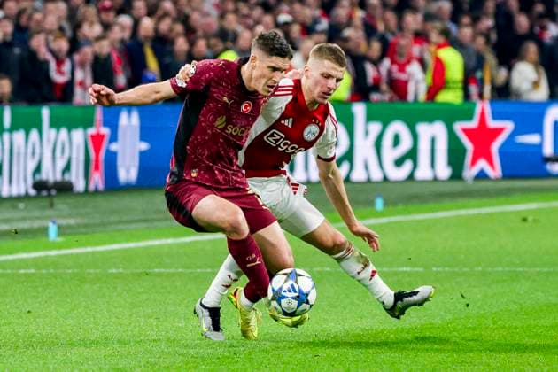 Roland Sallai of Galatasaray and Anton Gaaei of AFC Ajax battle for the ball AFC Ajax v Galatasaray A.S., UEFA Champions League 2025 26 League Phase MD4, AFC Ajax v Galatasaray A.S., Johan Cruijff ArenA, November 5, 2025, Amsterdam, Netherlands.