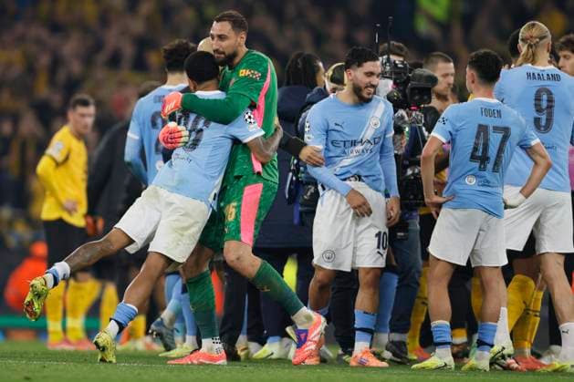 Manchester City v Borussia Dortmund - UEFA Champions League 2025 26 League Phase MD4 Savinho of Manchester City and Gianluigi Donnarumma, goalkeeper of Manchester City celebrate after winning the UEFA Champions League 2025 26 League Phase MD4 match between Manchester City and Borussia Dortmund at City of Manchester Stadium on November 5, 2025 in Manchester, England. Manchester City of Manchester Stadium England United Kingdom Copyright: xRichardxSellers Sportsphoto APLx 14140443