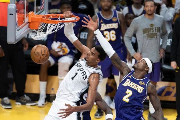 November 5, 2025, Los Angeles, California, USA: San Antonio SpursÃ¢â‚¬â ¢ Victor Wembanyama (1) dunks against Los Angeles LakersÃ¢â‚¬â ¢ Jarred Vanderbilt (2) during an NBA, Basketball Herren, USA basketball game, in Los Angeles Wednesday, Nov. 5, 2025. Los Angeles USA - ZUMAc68_ 20251105_zaf_c68_021 Copyright: xRingoxChiux