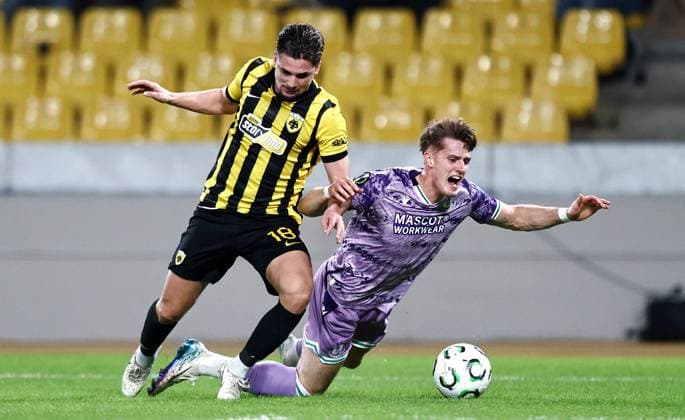 UEFA Europa Conference League Group Phase, OPAP Arena, Athens, Greece 6 11 2025 AEK Athens vs Shamrock Rovers Rovers John McGovern with RÄƒzvan Marin of AEK Athens John McGovern with RÄƒzvan Marin 6 11 2025  Copyright: x INPHOx PER_4713