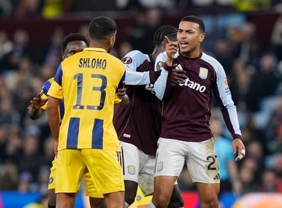 Birmingham, England, 6th November 2025. Morgan Rogers of Aston Villa exchanges words with Raz Shlomo of Maccabi Tel-Aviv during the Aston Villa vs Maccabi Tel-Aviv FC UEFA Europa League match at Villa Park, Birmingham. Picture credit should read: Andrew Yates Sportimage EDITORIAL USE ONLY. No use with unauthorised audio, video, data, fixture lists, club league logos or live services. Online in-match use limited to 120 images, no video emulation. No use in betting, games or single club league player publications. SPI_046_AY_Villa_Macabbi SPI-4269-0046