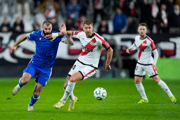 November 6, 2025, Madrid, Madrid, SPAIN: Mikael Ishak of Lech Poznan and Florian Lejeune of Rayo Vallecano in action during the UEFA Conference League 2025 26 League Phase MD3 match between Rayo Vallecano de Madrid and KKS Lech Poznan at Estadio Vallecas on November 06, 2025 in Madrid, Spain. Madrid SPAIN - ZUMAa181 20251106_zaa_a181_029 Copyright: xDennisxAgyemanx