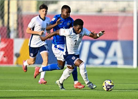 England v Haiti : Group E - FIFA U-17 World Cup Qatar 2025 Ryan Kelly Mcaidoo of England and Miguel Joseph of Haiti in action during the FIFA U-17 World Cup Qatar 2025 Group E match between England and Haiti in Doha, Qatar, on November 7, 2025. DOHA Qatar Copyright: xNOUSHADx