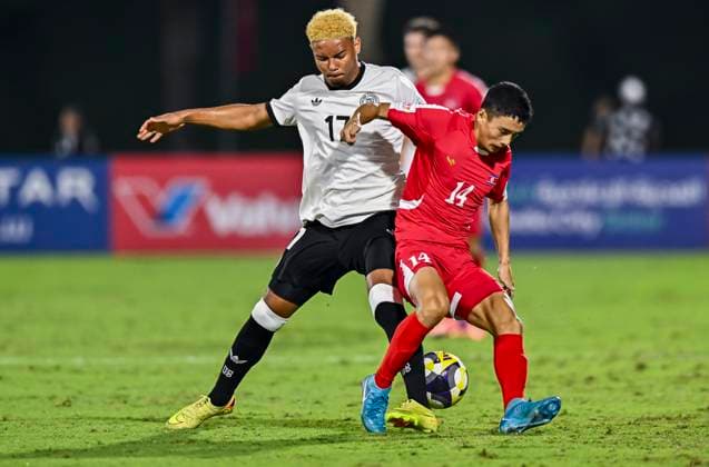 Germany v Korea DPR : Group G - FIFA U-17 World Cup Qatar 2025 Maik Afri Akumu of Germany and Tae Guk Kim of Korea DPR in action during the FIFA U-17 World Cup Qatar 2025 Group G match between Germany and Korea DPR in Doha, Qatar, on November 7, 2025. DOHA Qatar Copyright: xNOUSHADxTHEKKAYILx