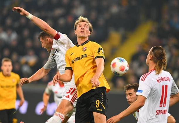 v.l.: Robin Knoche (Nürnberg), Vincent Vermeij (Dresden), 07.11.2025, Fussball, GER, Saison 2025 2026, 2. Bundesliga, Zweite Liga, 12. Spieltag, Rudolf-Harbig-Stadion Dresden, SG Dynamo Dresden - 1. FC Nürnberg, DFB AND DFL REGULATIONS PROHIBIT ANY USE OF PHOTOGRAPHS as IMAGE SEQUENCES and or QUASI-VIDEO,