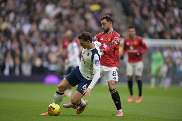 Spurs vs Man Utd, Premier League Joao Palhinha of Tottenham Hotspur clashes with Bruno Fernandes of Manchester United, ManU during the Spurs vs Man Utd, Premier League match at the Tottenham Hotspur Stadium London. London Tottenham Hotspur Stadium UK Copyright: xMartinxDaltonx Spurs_vs_ManUtd_081125_MD_109