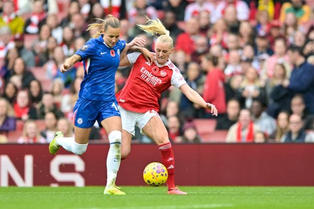 Stina Blackstenius of Arsenal Women drives forward with the ball whilst being challneged by Nathalie Bjorn of Chelsea Women during the Women s Super League match between Arsenal Women and Chelsea Women at the Emirates Stadium, London, England on 8 November 2025. Copyright: xPhilxHutchinsonx 44250007