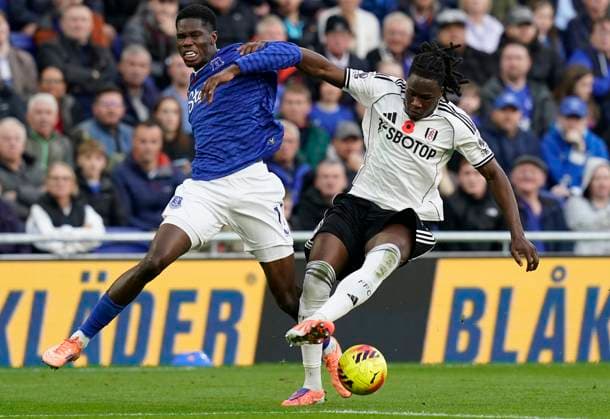 Liverpool, England, 8th November 2025. Calvin Bassey of Fulham (R) is challenged by Thierno Barry of Everton during the Everton vs Fulham Premier League match at Hill Dickinson Stadium, Liverpool. Picture credit should read: Andrew Yates Sportimage EDITORIAL USE ONLY. No use with unauthorised audio, video, data, fixture lists, club league logos or live services. Online in-match use limited to 120 images, no video emulation. No use in betting, games or single club league player publications. SPI_005_AY_EVERTON_FULHAM SPI-4273-0004