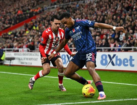 Jurrien Timber of Arsenal fends off Enzo Le Fee of Sunderland Sunderland v Arsenal, Premier League, Football, Stadium of Light, Sunderland, UK - 08 Nov 2025Sunderland Stadium of Light United Kingdom EDITORIAL USE ONLY No use with unauthorised audio, video, data, fixture lists, club league logos or live services. Online in-match use limited to 120 images, no video emulation. No use in betting, games or single club league player publications.  Copyright: xRichardxLee Shutterstockx 15702163s