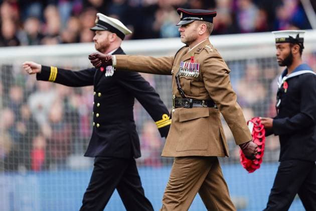 Representatives of the armed forces perform a wreath laying ceremony prior to the Premier League game between Crystal Palace and Brighton and Hove Albion at Selhurst Park in London, England. Copyright: xLiamxAsman SPPx Sportspressphoto_SPR59546