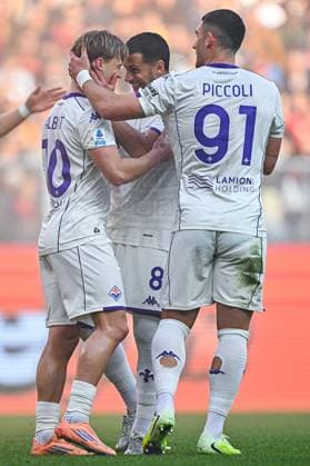 November 9, 2025, Genoa, Genoa: Fiorentina s Icelander forward Albert Gudmundsson (left) celebrates with his team-mates Italian midfielder Rolando Mandragora and Italian forward Roberto Piccoli after scoring a goal on a penalty kick during the Italian Serie A soccer match Genoa Cfc vs Acf Fiorentina at Luigi Ferraris stadium in Genoa, Italy, 9 November 2025. ANSA STRINGER. Italy Soccer: Serie A; Genoa Cfc Vs Acf Fiorentina  - ZUMAa110 20251109_zaf_a110_054 Copyright: xStringerx