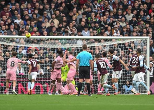 Birmingham, England, 9th November 2025. Emi Buendia of Aston Villa scores his sides first goal during the Aston Villa vs AFC Bournemouth Premier League match at Villa Park, Birmingham. Picture credit should read: Cody Froggatt Sportimage EDITORIAL USE ONLY. No use with unauthorised audio, video, data, fixture lists, club league logos or live services. Online in-match use limited to 120 images, no video emulation. No use in betting, games or single club league player publications. SPI_022_CF_ASTON_VILLA_V_BOURNEMOUTH SPI-4279-0021