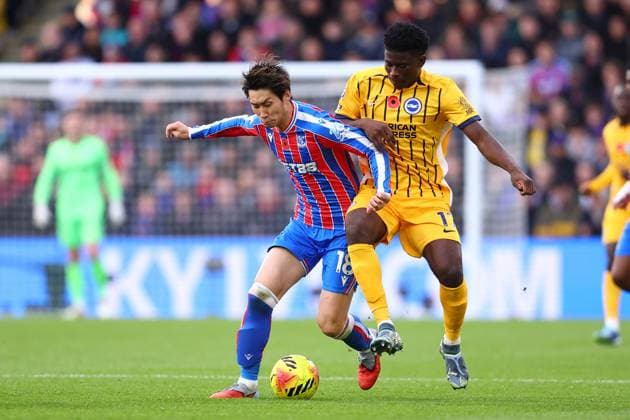 London, England, 9th November 2025. Daichi Kamada of Crystal Palace and Carlos Baleba of Brighton and Hove Albion challenge for the ball during the Crystal Palace vs Brighton and Hove Albion Premier League match at Selhurst Park, London. Picture credit should read: Paul Terry Sportimage EDITORIAL USE ONLY. No use with unauthorised audio, video, data, fixture lists, club league logos or live services. Online in-match use limited to 120 images, no video emulation. No use in betting, games or single club league player publications. SPI_019_PT_Crystal_Palace_Brighton SPI-4277-0019