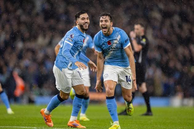 Football - FA Premier League - Manchester City FC v Liverpool FC MANCHESTER, ENGLAND - Manchester City s Nico Gonzalez celebrates with team-mate Rayan Cherki (L) after scoring the second goal during the FA Premier League match between Manchester City FC and Liverpool FC at the City of Manchester Stadium. (Photo by David Rawcliffe Propaganda) MANCHESTER City of Manchester Stadium GREATER MANCHESTER ENGLAND  Copyright: xDavidxRawcliffex P2025-11-09-Man_City_Liverpool-71