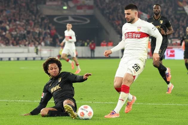 09.11.2025, xrekx, Fussball 1.Bundesliga, VfB Stuttgart - FC Augsburg v.l. Han-Noah Massengo (FC Augsburg) Deniz Undav (VfB Stuttgart) Zweikampf, Aktion, action, battle for the ball (DFL DFB REGULATIONS PROHIBIT ANY USE OF PHOTOGRAPHS as IMAGE SEQUENCES and or QUASI-VIDEO) Stuttgart