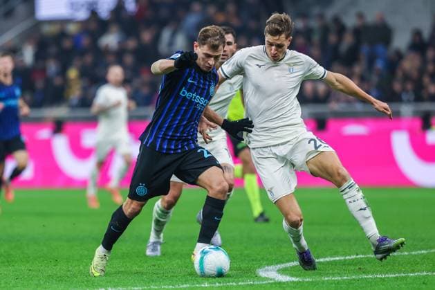 FC Internazionale vs SS Lazio - Serie A 2025 26 - 09 11 2025 Nicolo Barella of FC Internazionale competes for the ball with Toma Basic of SS Lazio during Serie A 2025 26 football match between FC Internazionale and SS Lazio at San Siro Stadium in Milan Copyright: xBEAUTIFULxSPORTS Carabellix