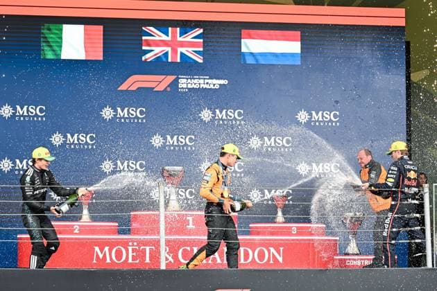 Lando Norris of McLaren, Kimi Antonelli of Mercedes-AMG, Max Verstappen of Red Bull and Mark Norris, Director of Commercial Trackside Operations at McLaren on the podium after the F1 Grand Prix of Brazil at Autodromo Jose Carlos Pace on November 09, 2025 in Sao Paulo, Brazil. (Photo by Richard Callis SPP) Copyright: xRichardxCallis SPPx Sportspressphoto_SPR59980