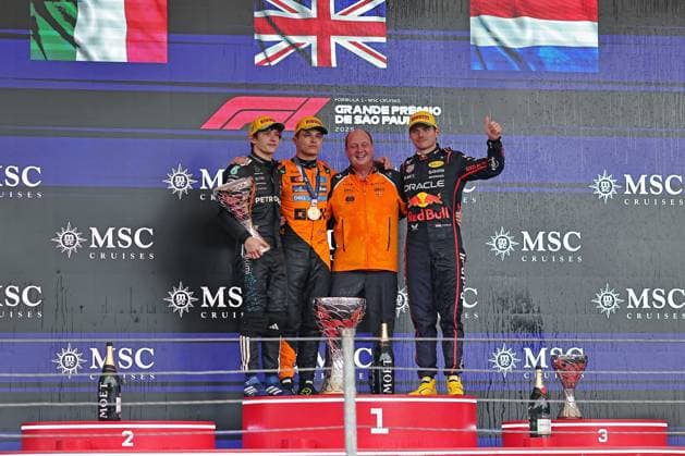 9th November 2025; Sao Paulo, Brazil: (L-R) Second-place winner Kimi Antonelli (ITA) Mercedes AMG Petronas F1 Team W16, first-place winner Lando Norris (GBR) McLaren F1 Team MCL39 Mercedes, Mark Norris, Director Commercial Trackside Operations McLaren F1 Team MCL39 Mercedes and third-place winner Max Verstappen (NED) Oracle Red Bull Racing RB21 Honda celebrate after the F1 Grand Prix of Brazil at Autodromo Jose Carlos Pace  HeulerxAndrey